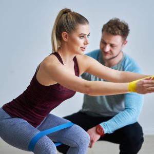 Picture of adult woman training with professional instructor